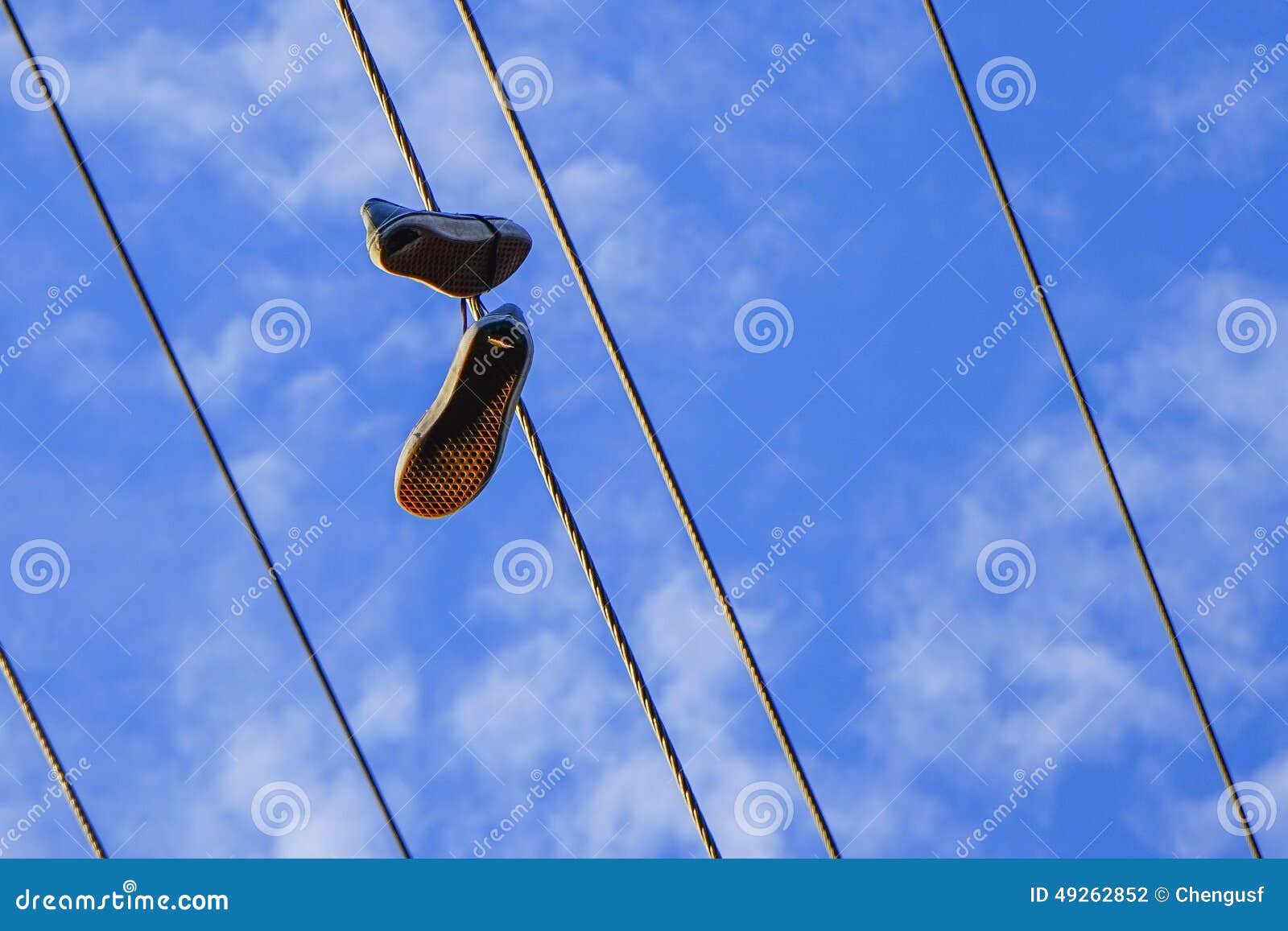 A Pair Of Shoes On Electro Wire Tower Stock Photo Image of industrial