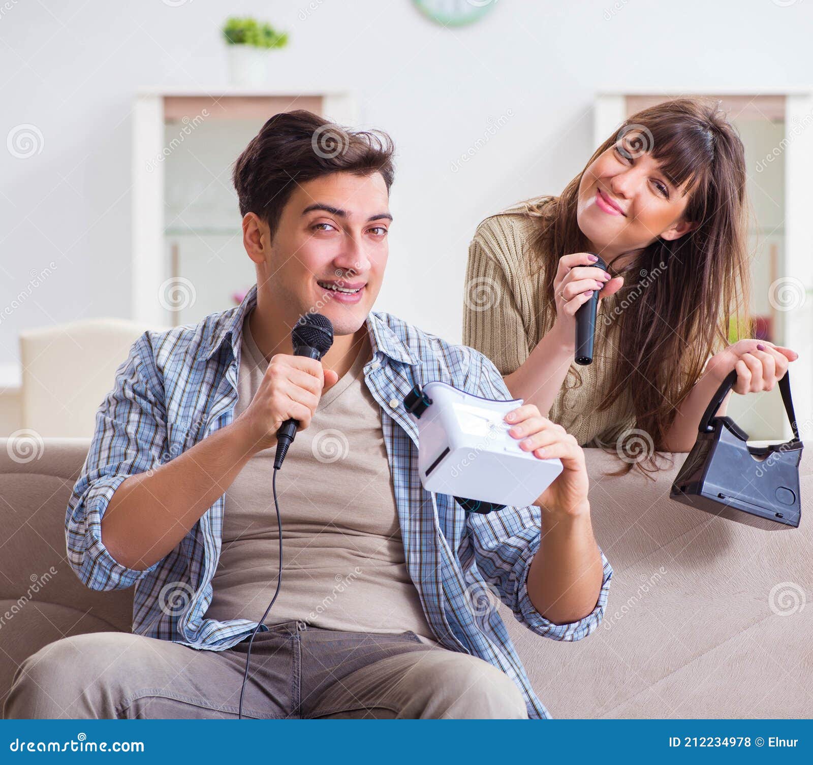 Pair Singing Karaoke with Virtual Reality Glasses Stock Photo Image