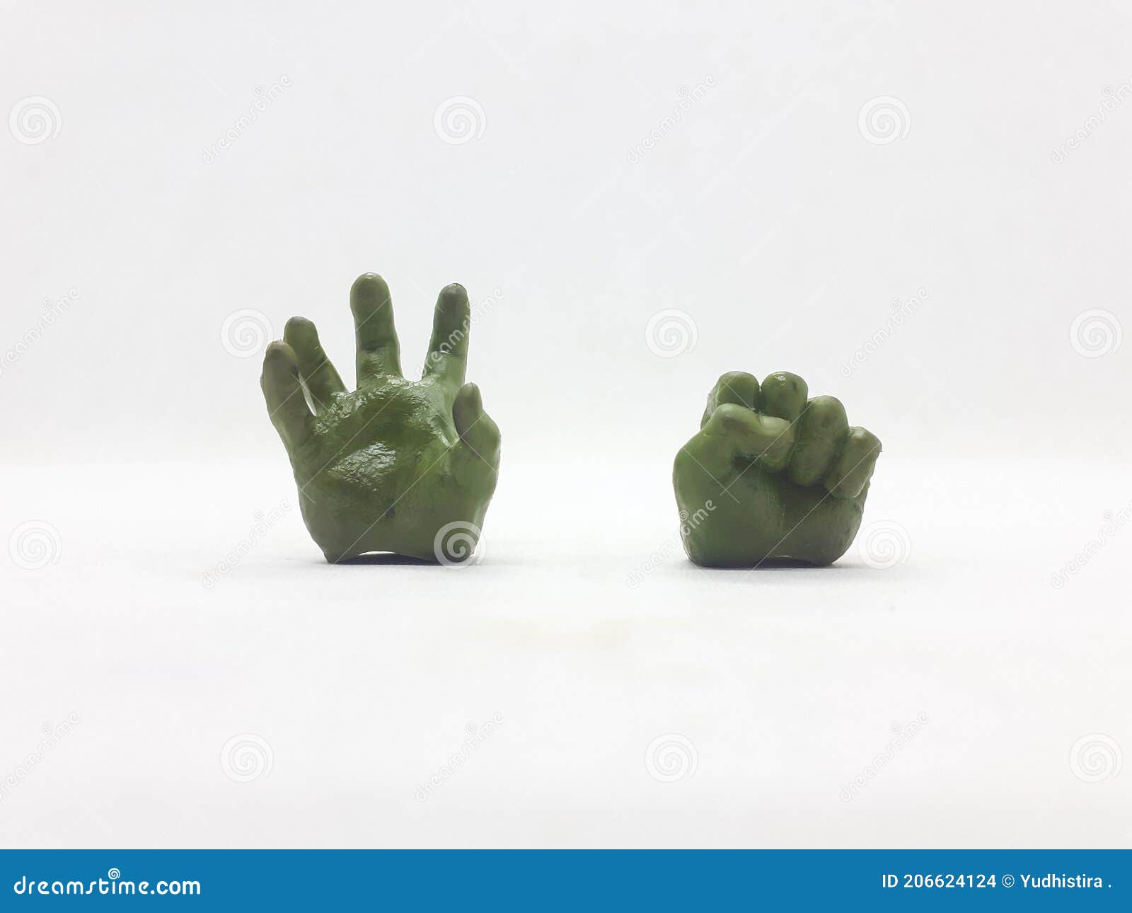 A Pair of Small Action Figure Hands on White Isolation Background Stock