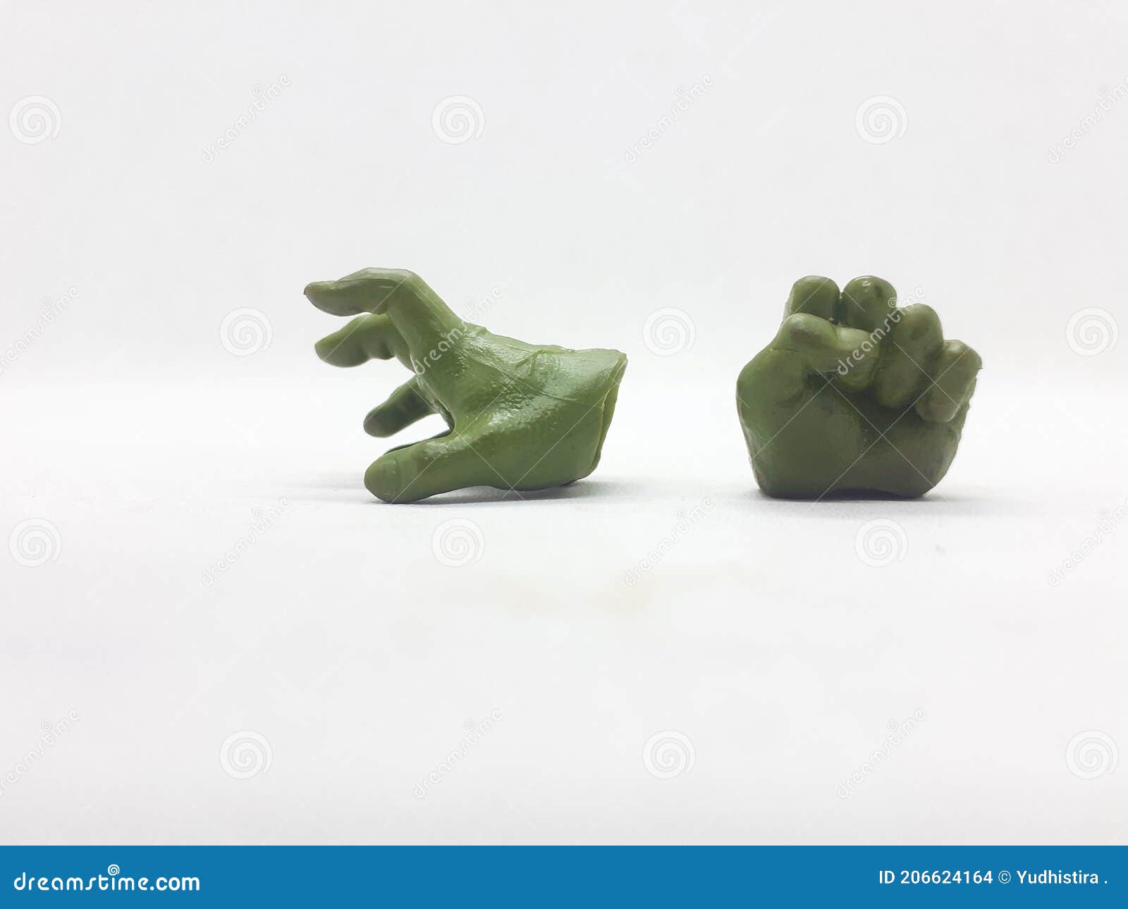 A Pair of Small Action Figure Hands on White Isolation Background Stock
