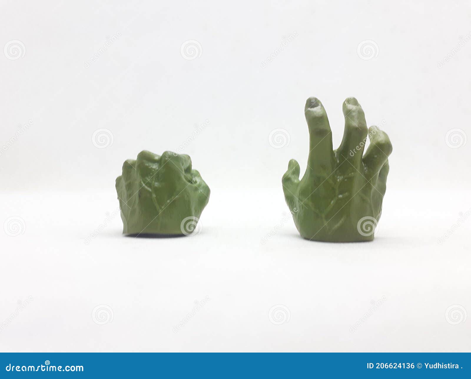 A Pair of Small Action Figure Hands on White Isolation Background Stock