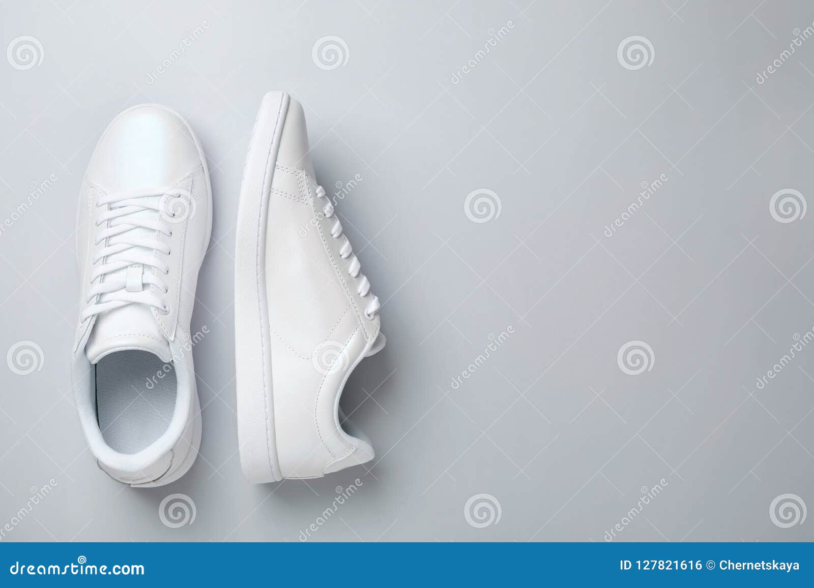 Pair of Trendy Sneakers on Light Background, Flat Lay Stock Photo ...