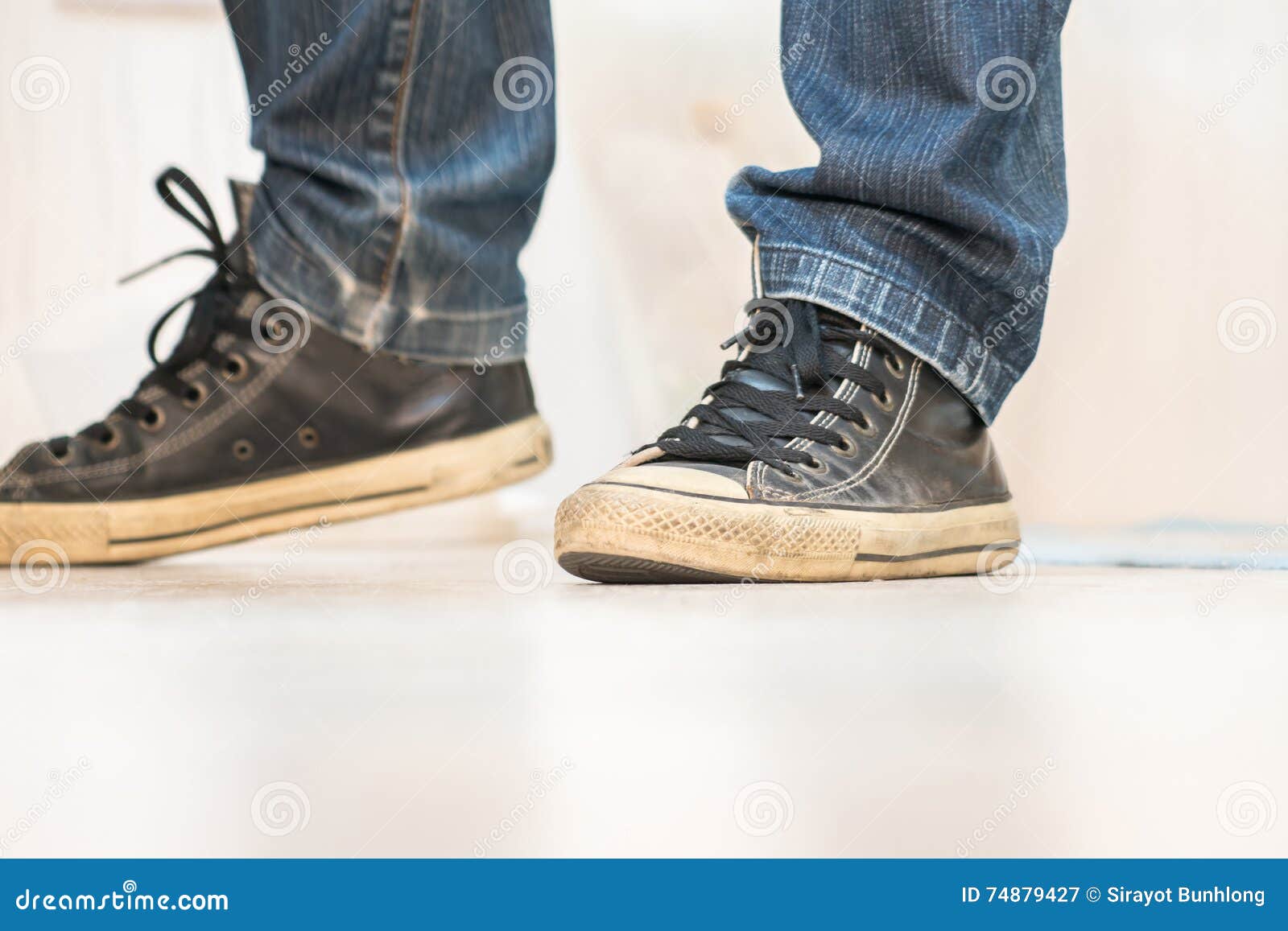 A Pair of Vintage Looking, Athletic Shoes and Skinny Jeans Stock Image ...