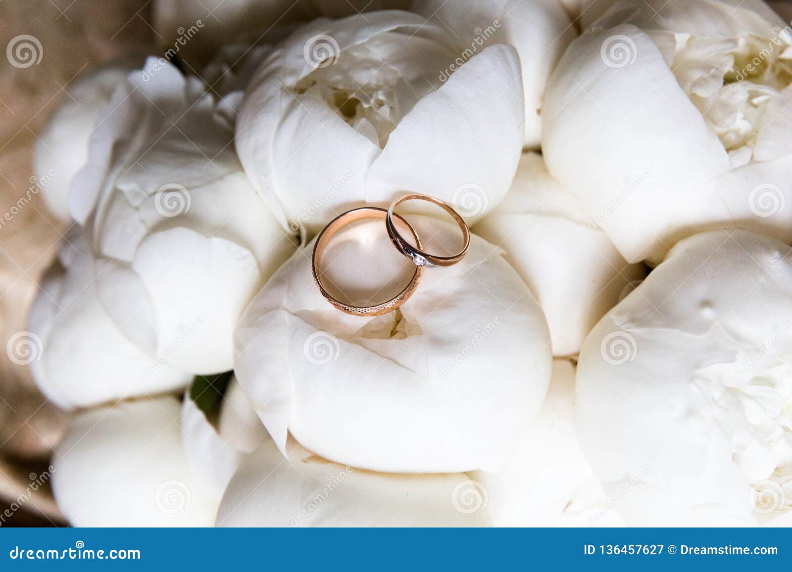 Wedding Rings on a Bouquet of Flowers Stock Image - Image of newlywed ...
