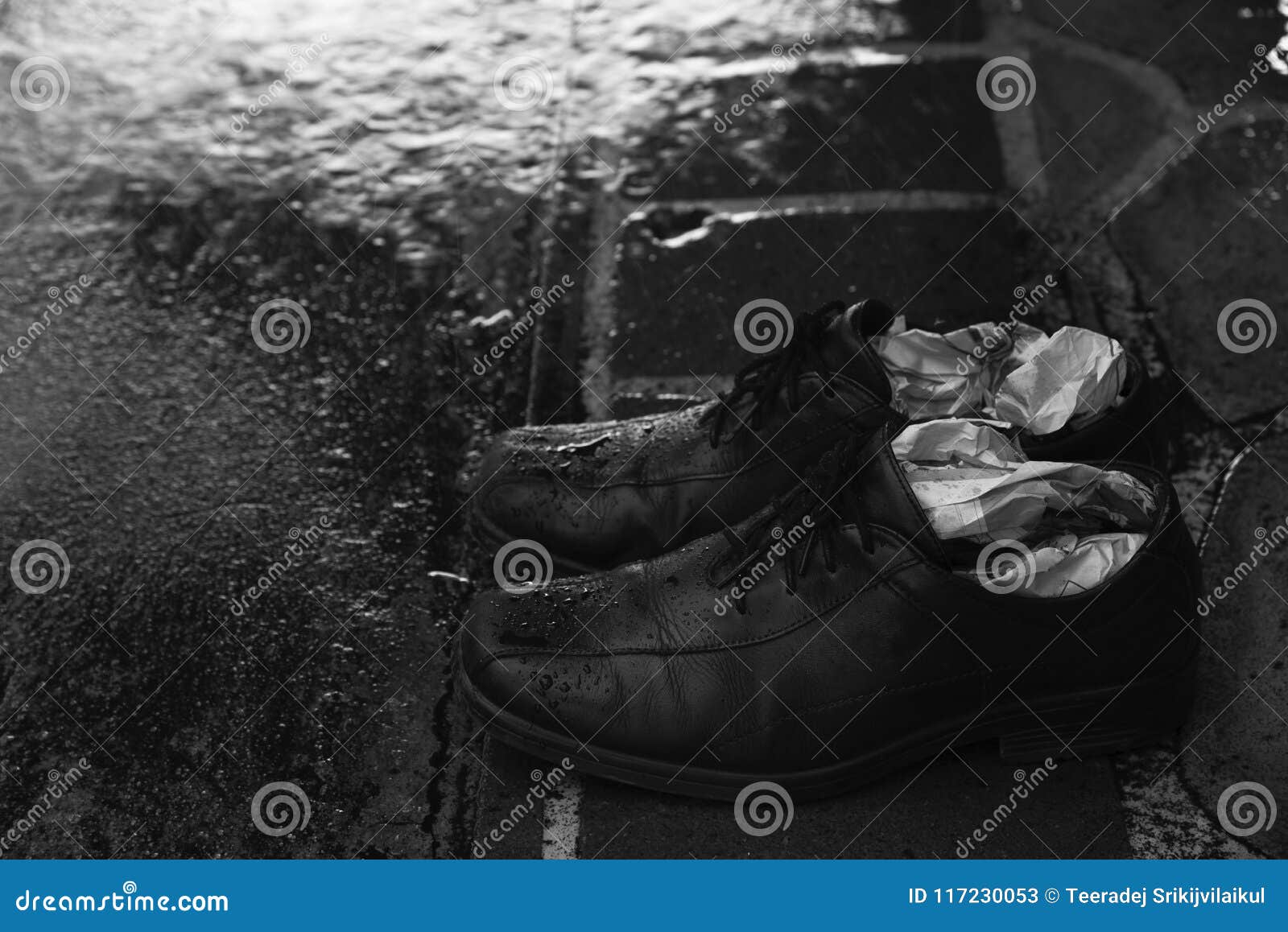 A Pair of Wet Shoes in a Rainy Day Stock Image - Image of storm, street ...