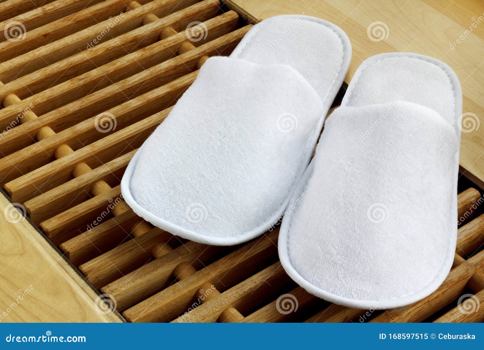 Pair of White Hotel Spa / Wellness Slippers Stock Image - Image of blue, 168597515