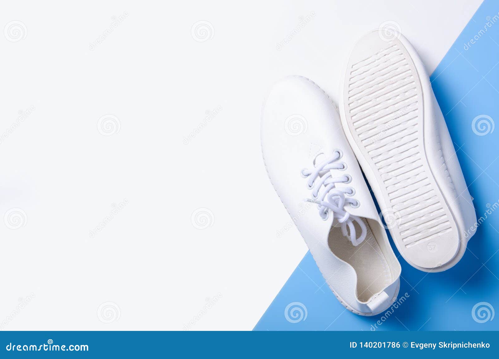 Pair of White Sneakers and Space for Text Stock Photo - Image of rubber ...