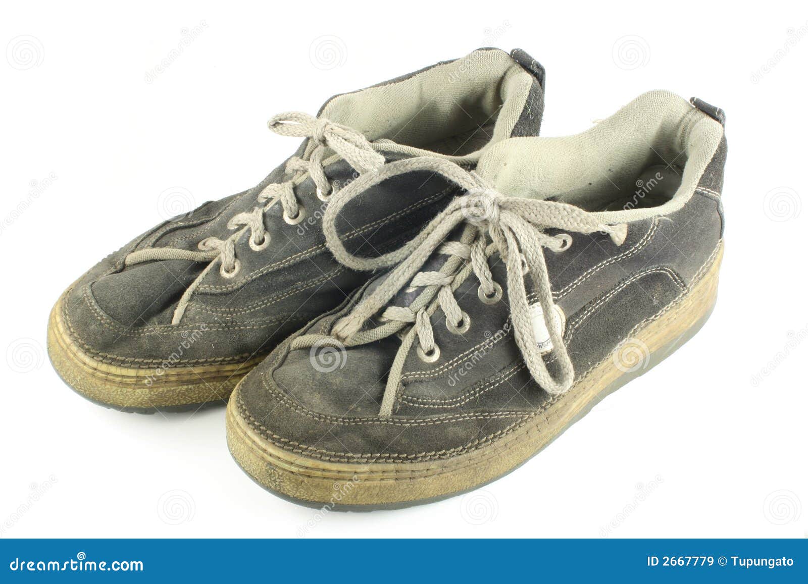 Pair of worn dirty shoes stock image. Image of equipment - 2667779