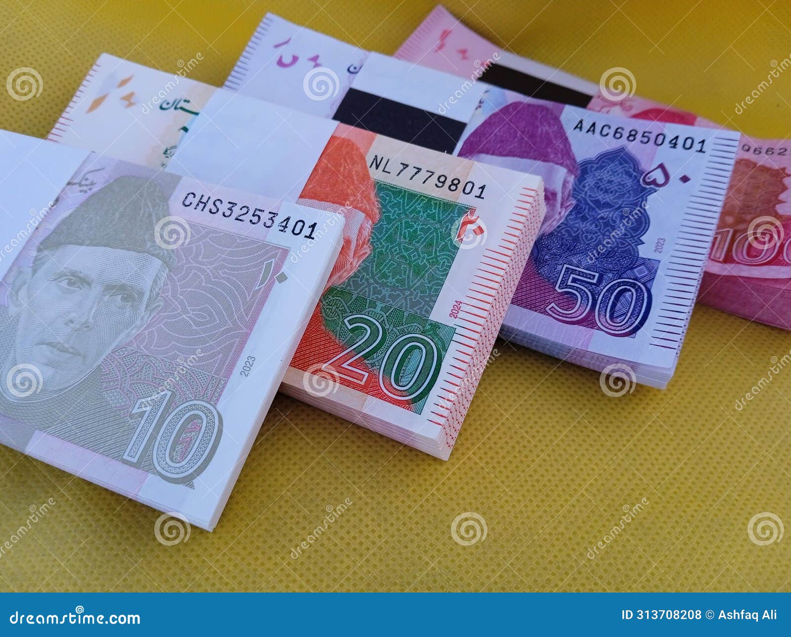 Pakistani New Currency Note Bundle of 10, 20, 50 and 100 Rupees. New Copy  of Rs.10, 20, 50, 100 Stock Photo - Image of currency, rs10: 313708208