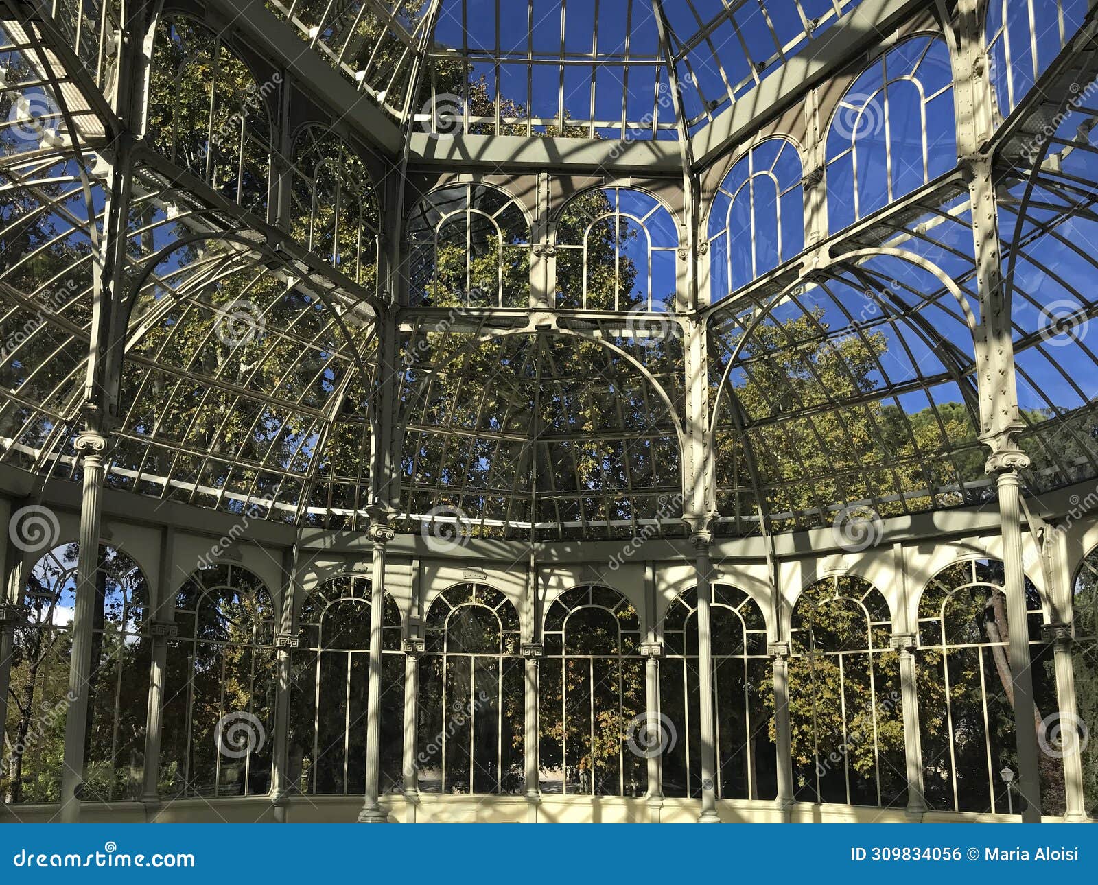 palacio de cristal, originally a greenhouse, located in the de el retiro park in madrid, spainp