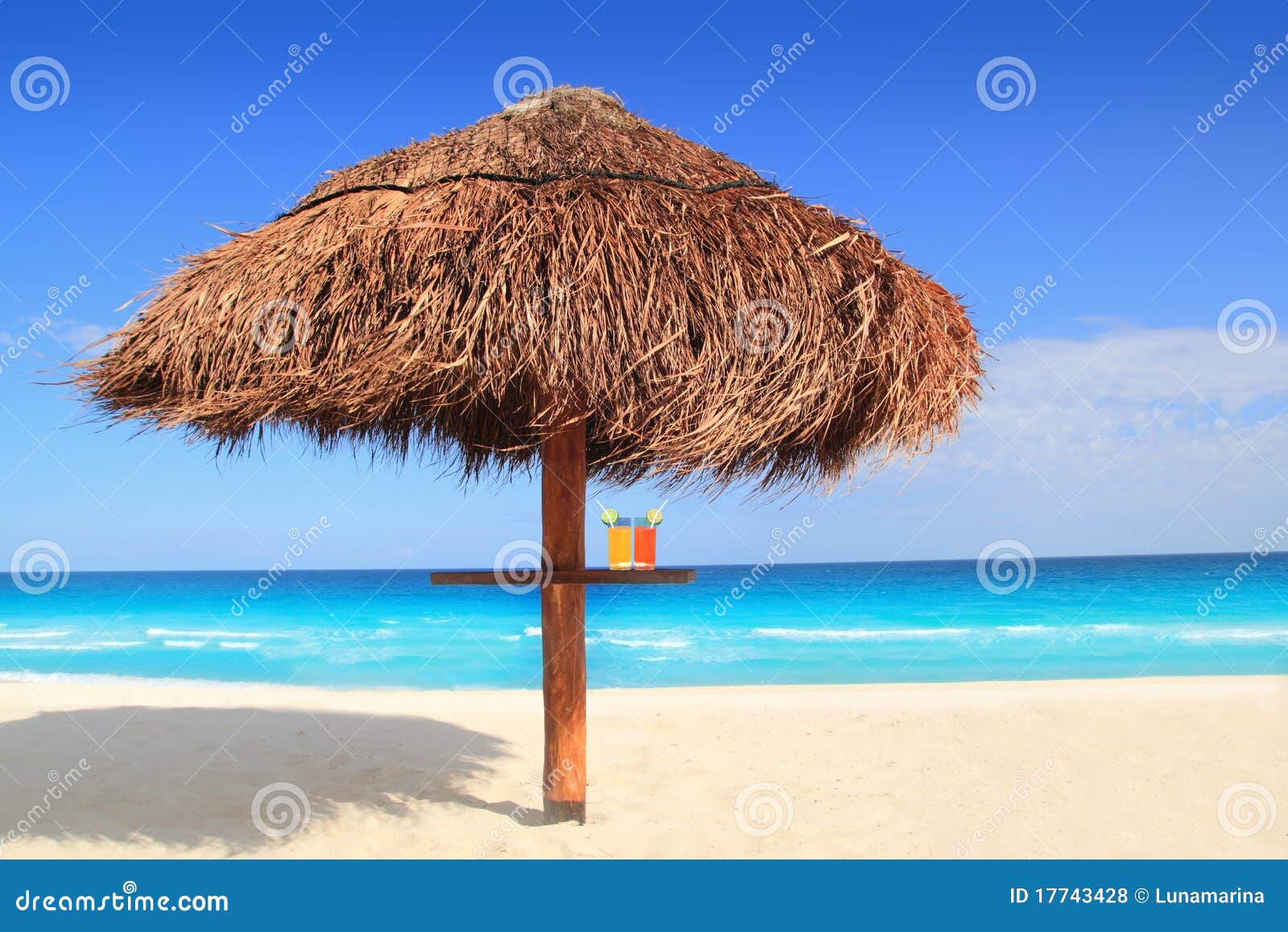 palapa sun roof beach umbrella in caribbean