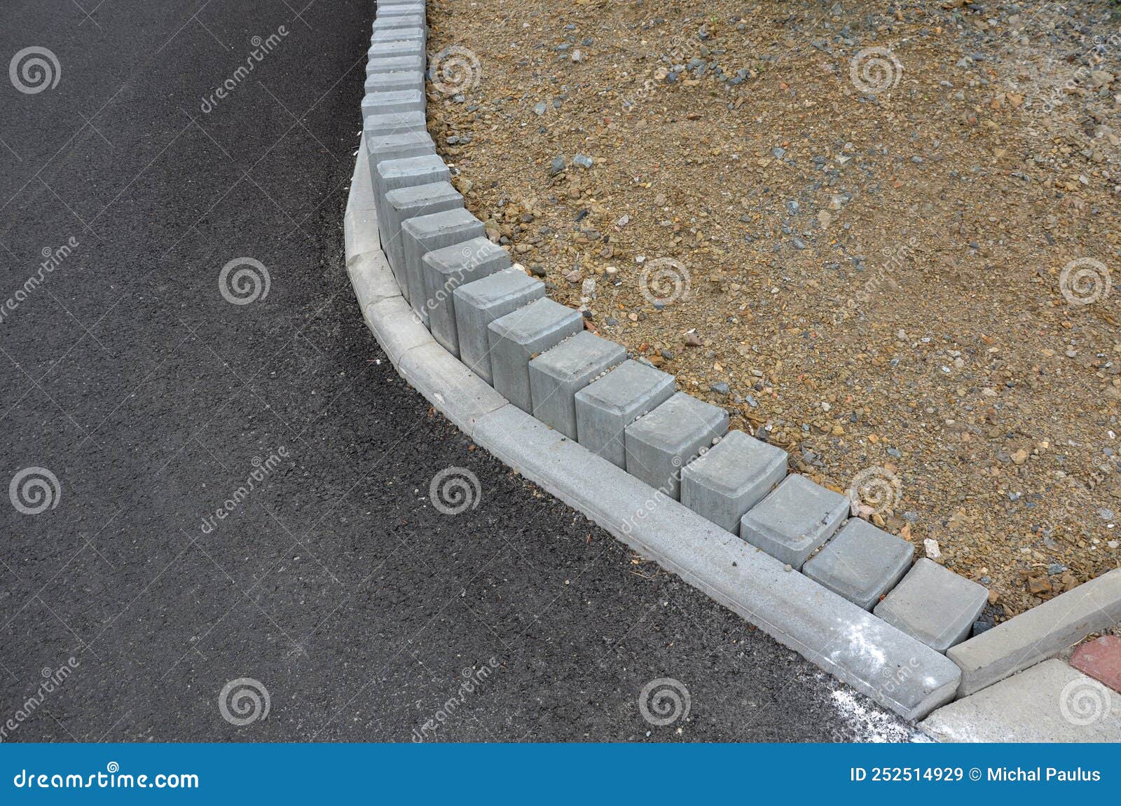 palisades made of square-profile concrete with sloping staircase arches in garden architecture. solution of smaller terrain differ