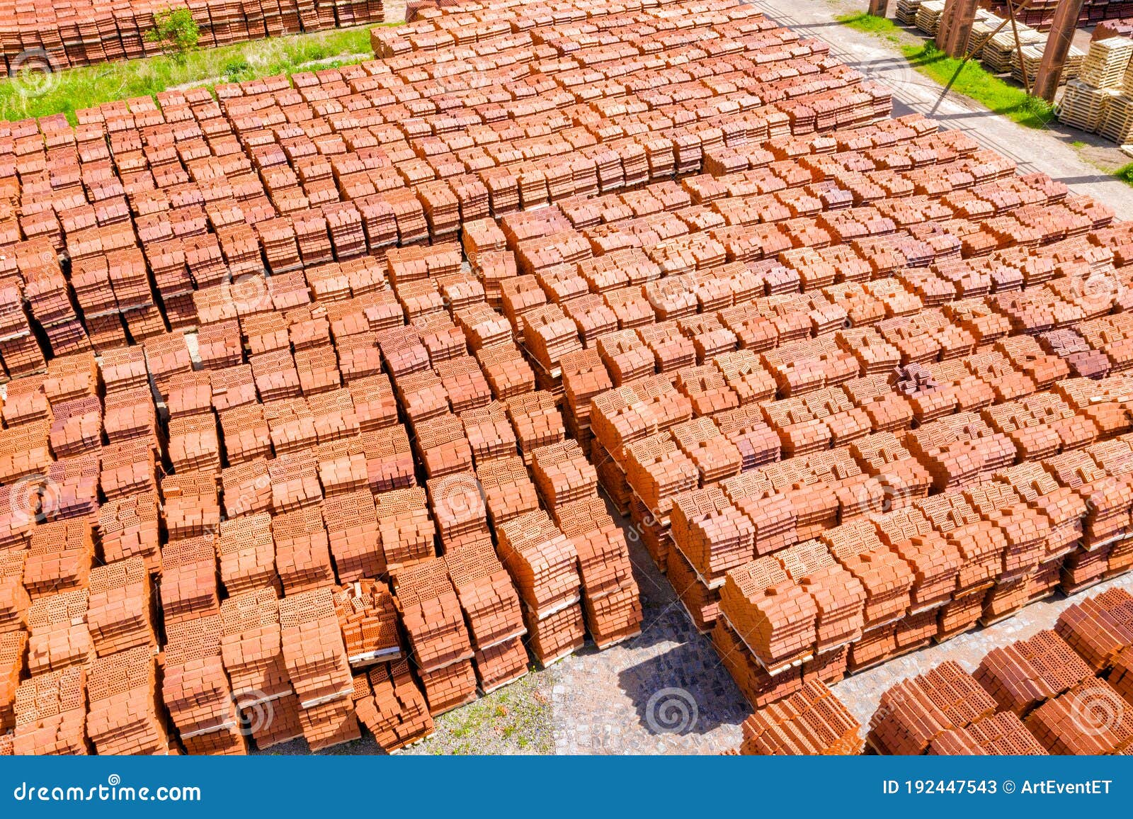 Pallets with Bricks in Warehouse of a Brick Factory. View from Above