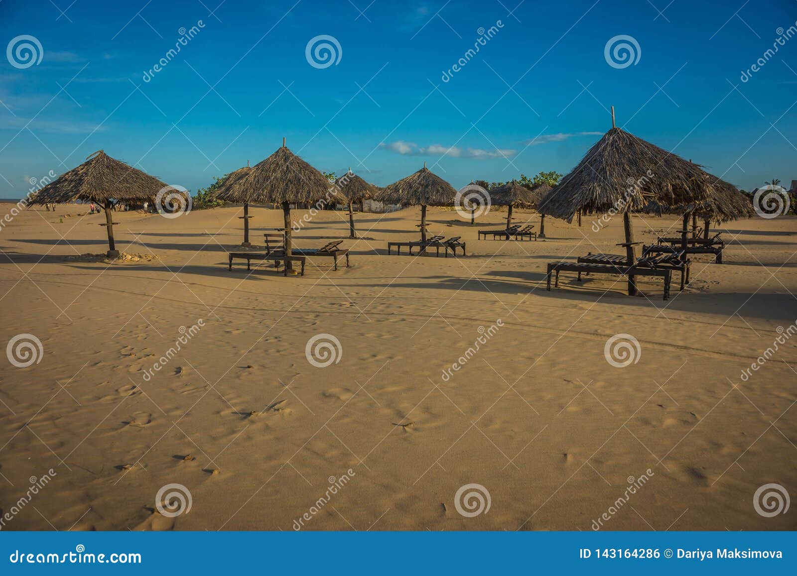 Palm Leaf Parasols on Beach in Malindi in Eastern Kenya Stock Photo