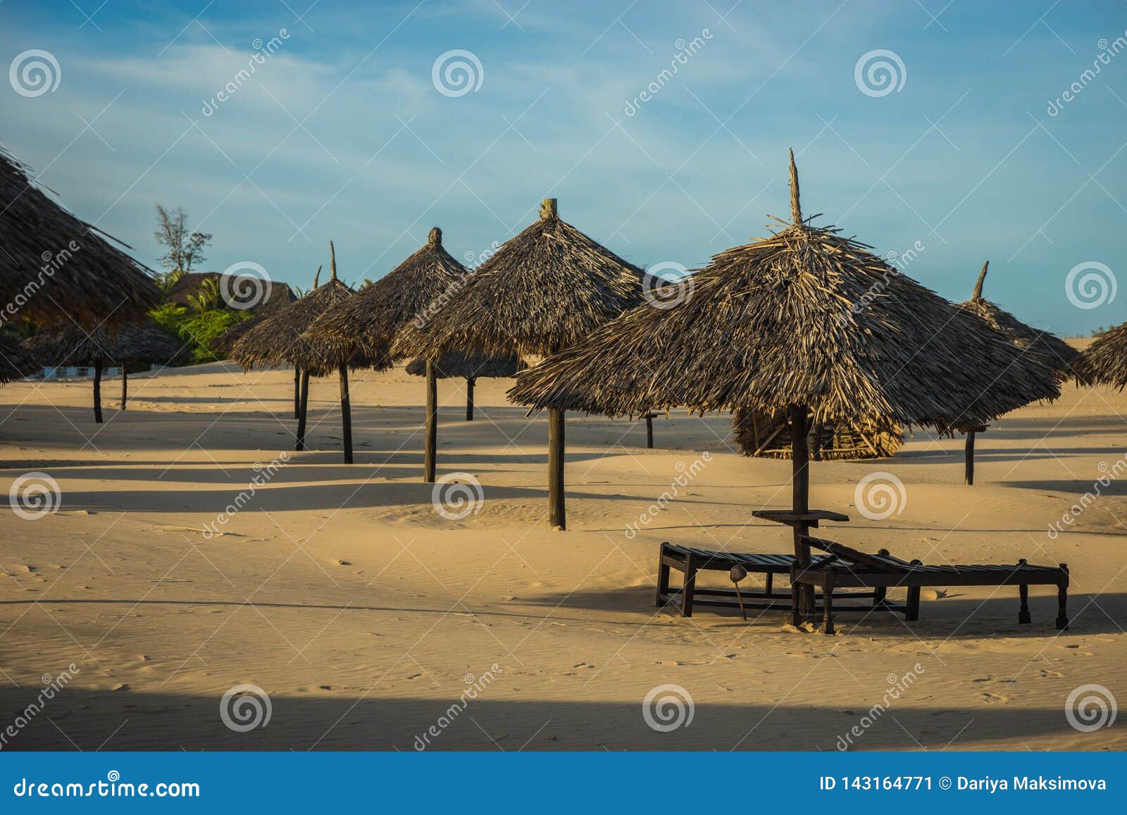 Palm Leaf Parasols on Beach in Malindi in Eastern Kenya Stock Image