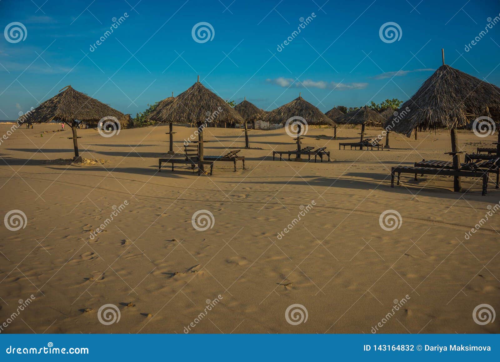 Palm Leaf Parasols on Beach in Malindi in Eastern Kenya Stock Photo