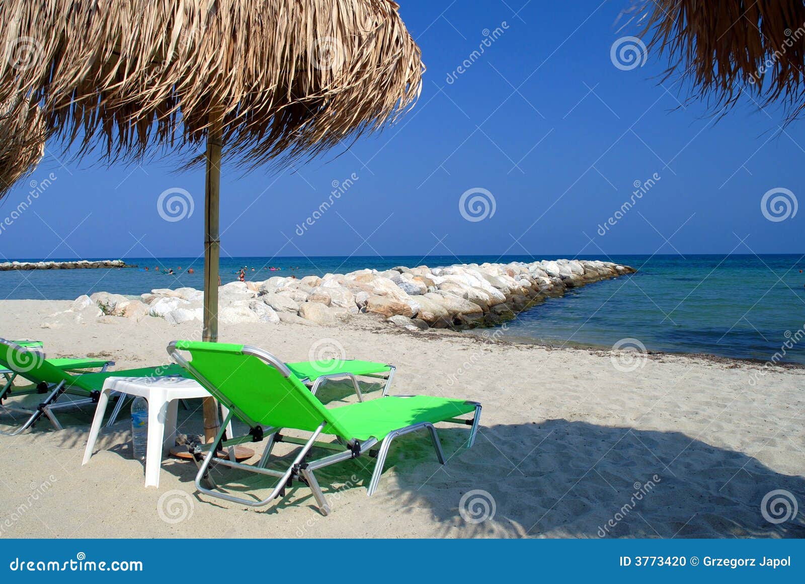 palm parasol at summer beach