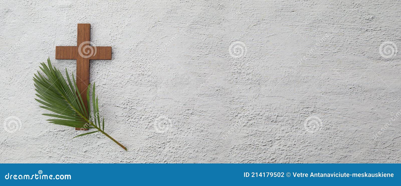 palm sunday background. cross and palm on grey background.