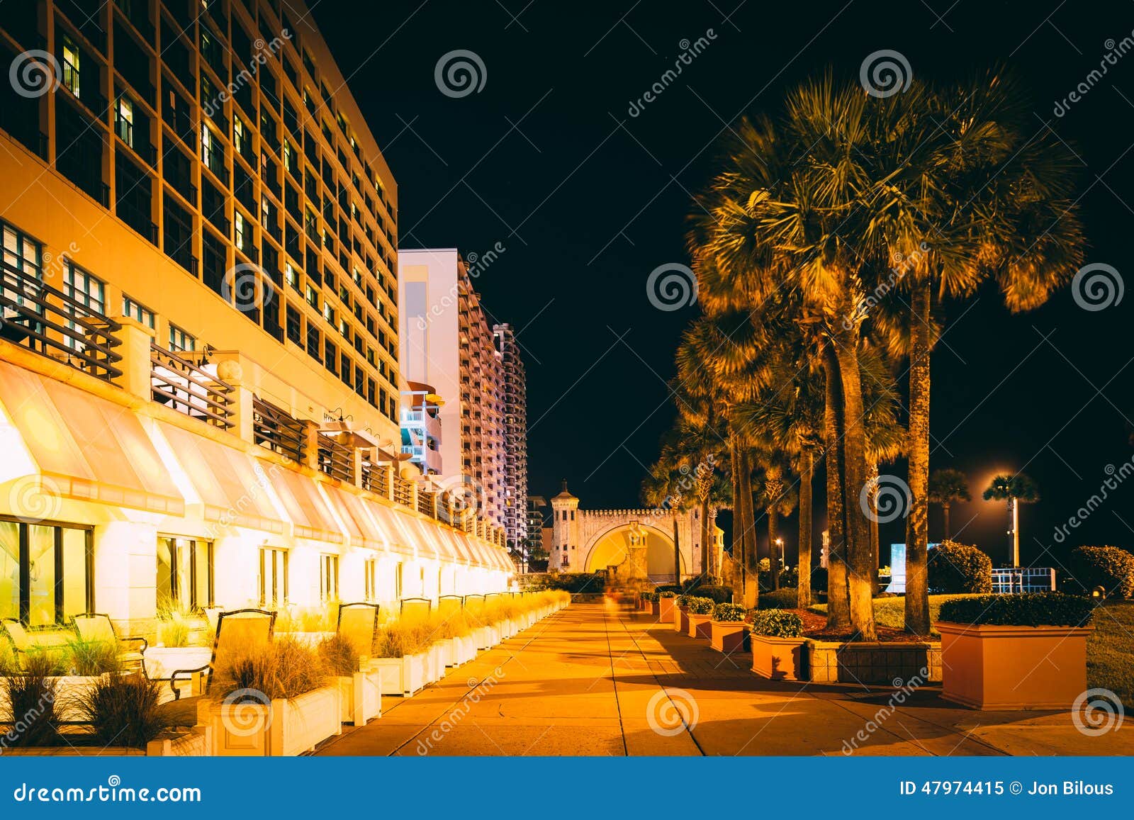 Palm Trees and Hotels at Night, in Daytona Beach, Florida. Stock Image