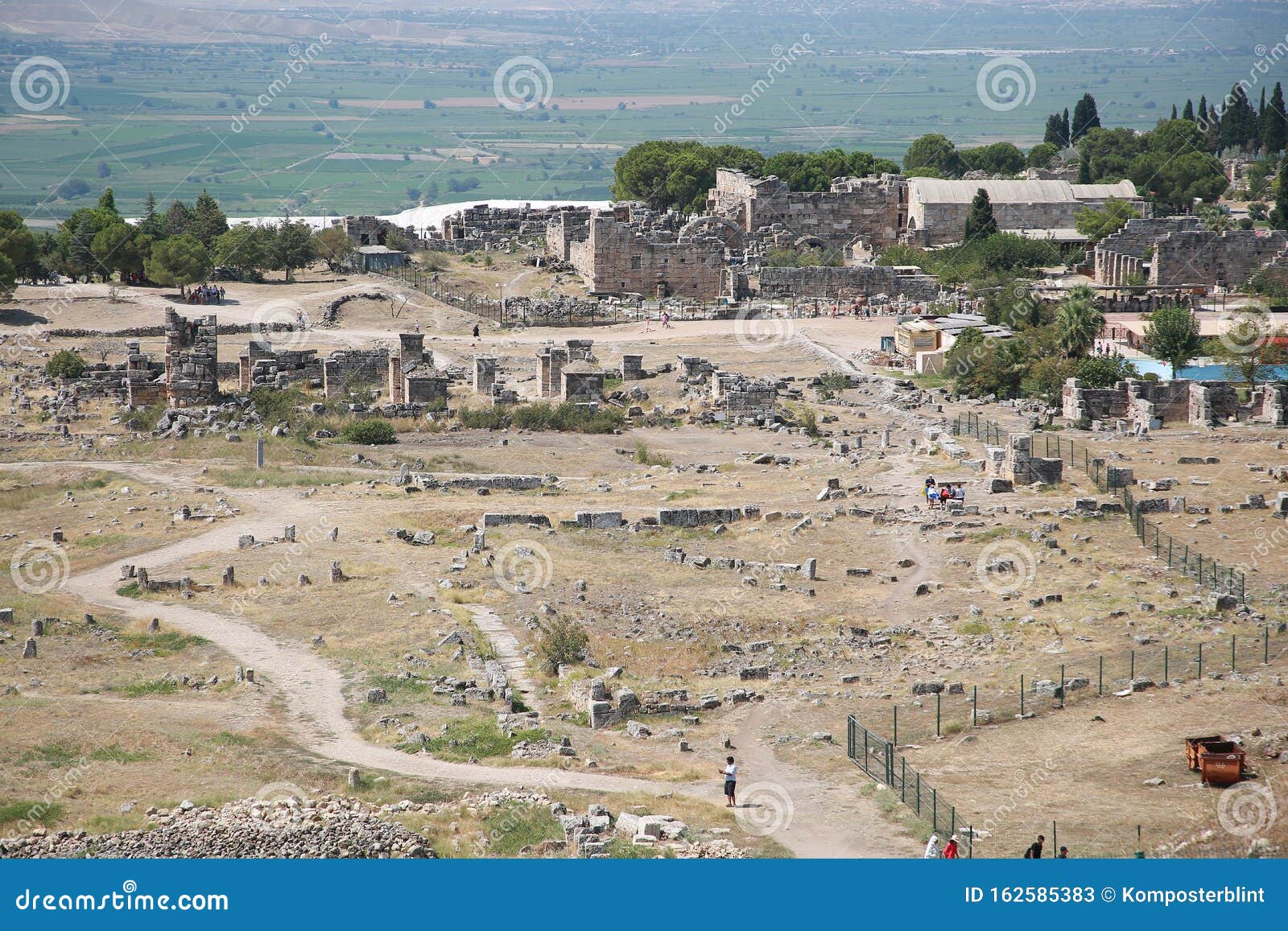 pamukkale, turkey. view of the territory of hierapolis from the amphitheater on a sunny day