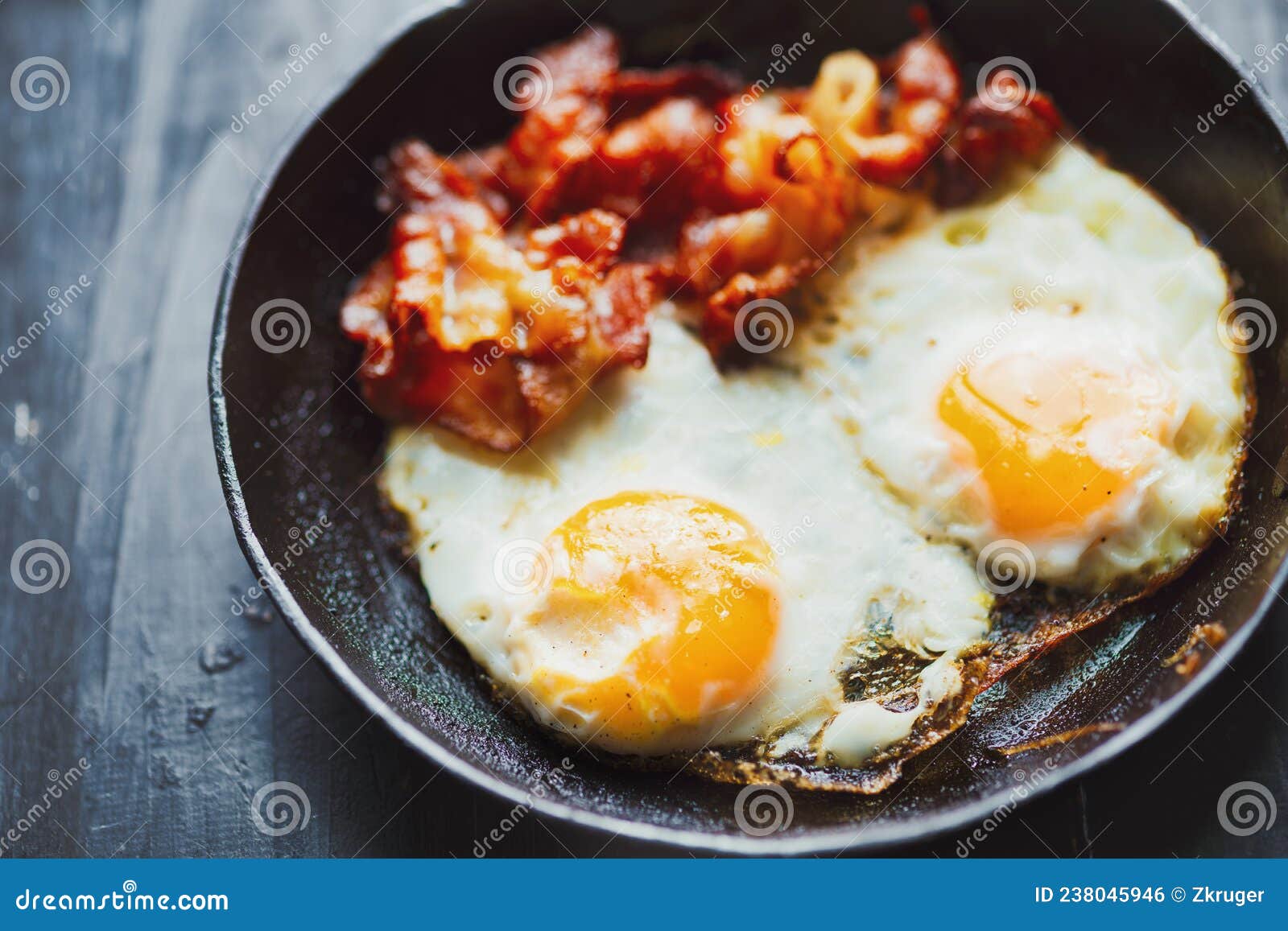 Pan of Bacon Fat Fried Eggs Breakfast Stock Photo Image of color