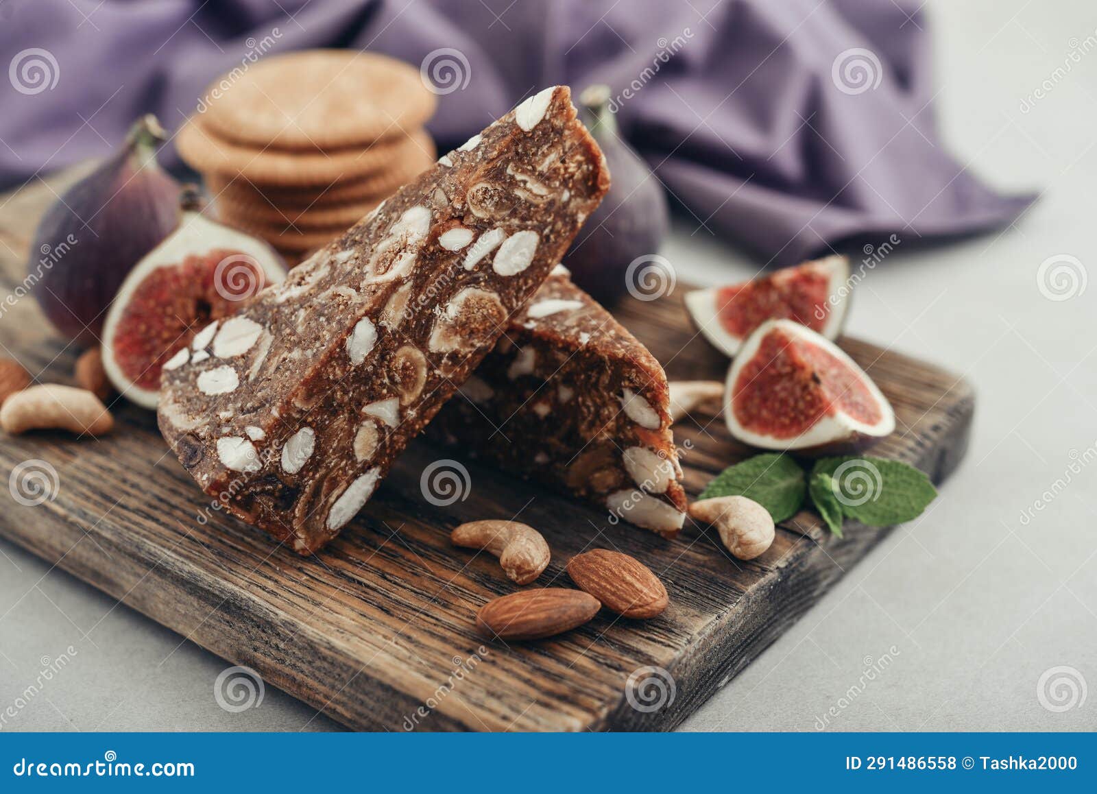pan de higo - spanish fig bread at wooden cutting board