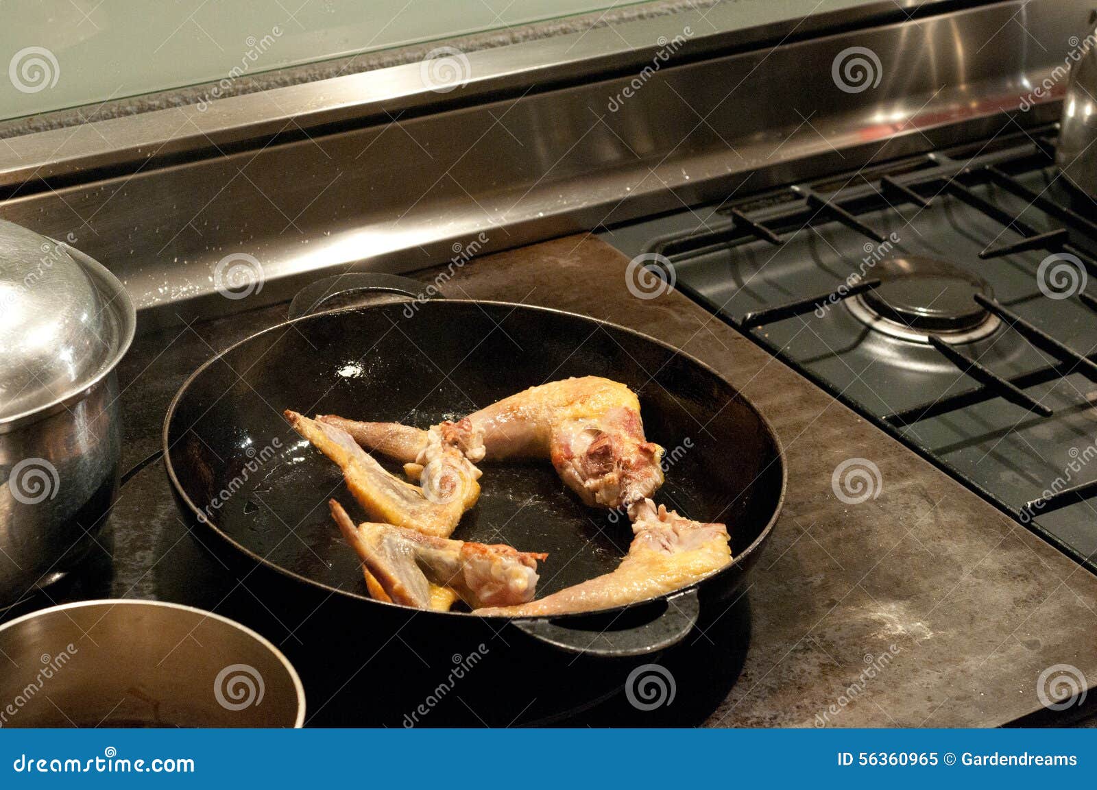 Panfried chicken stock image. Image of iron, cooking 56360965