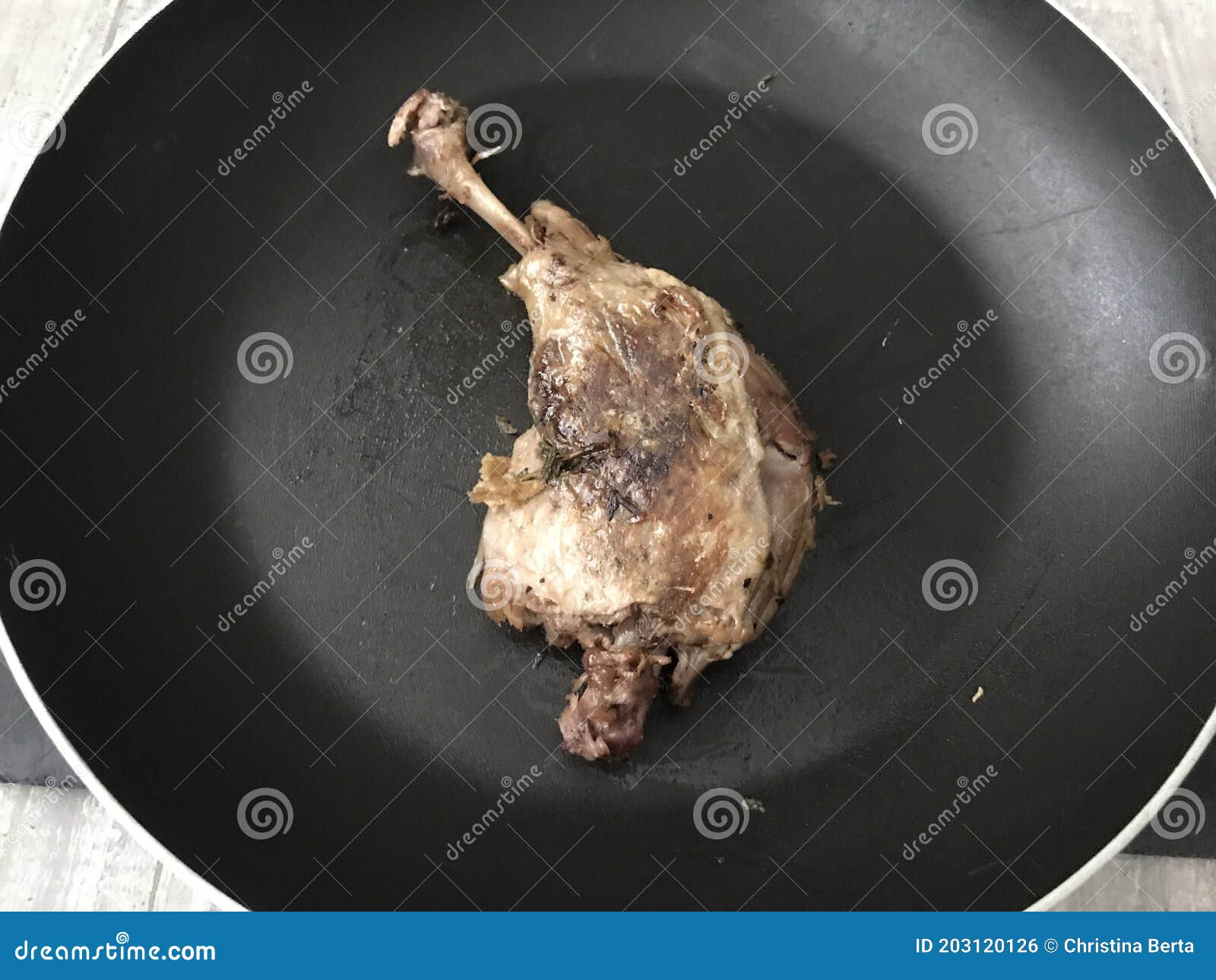Pan fried confit duck leg stock photo. Image of south 203120126