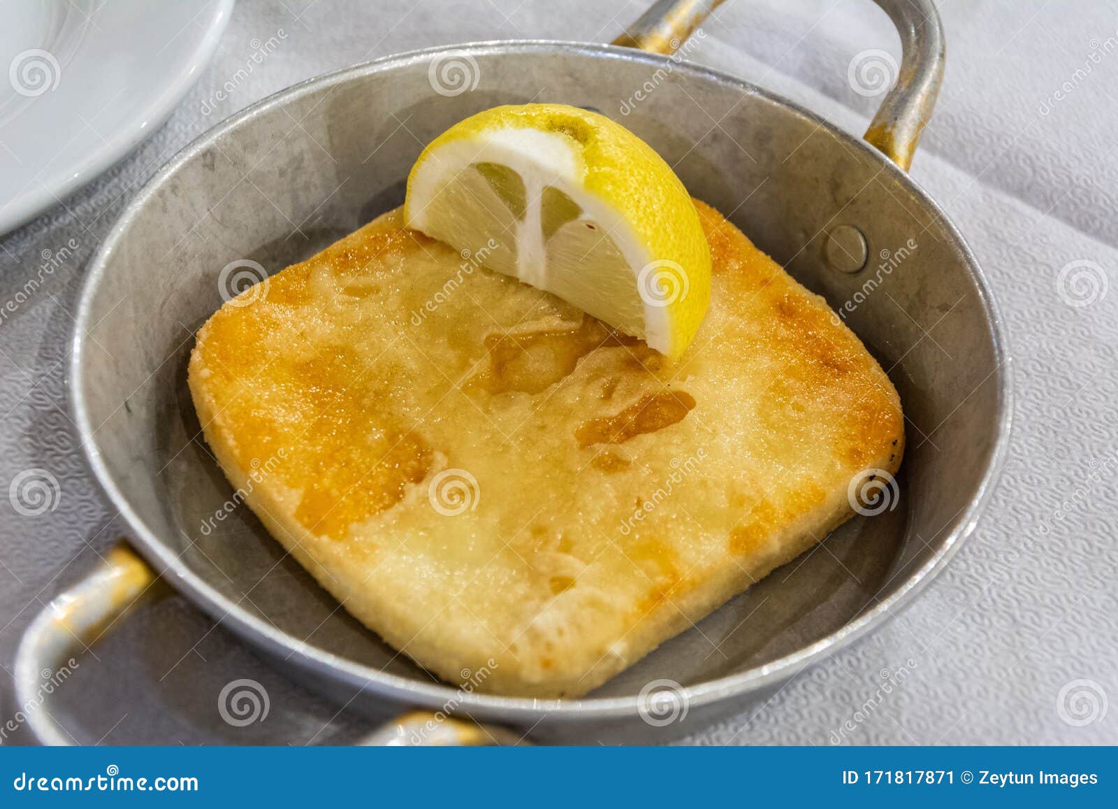 Pan with Fried Halloumi Cheese and Lemon Stock Image Image of