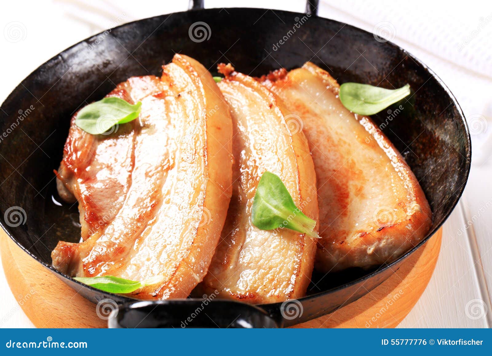 Pan fried pork belly stock photo. Image of fattening 55777776