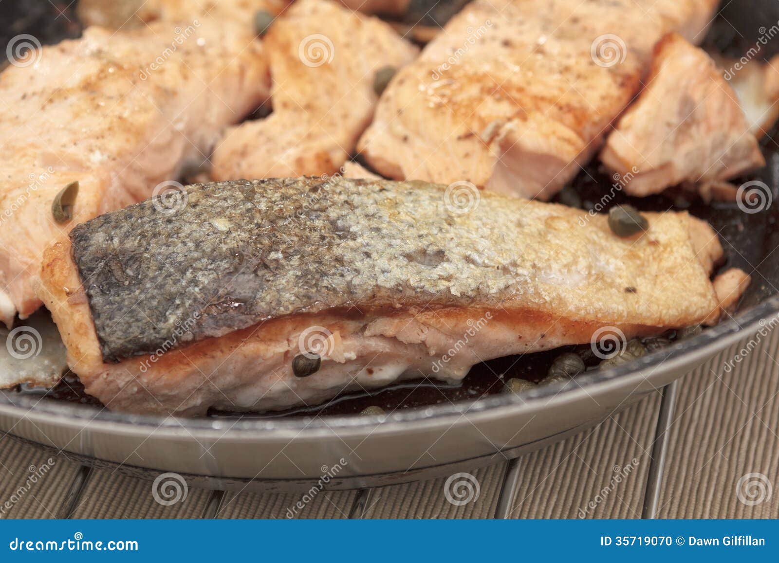 Pan fried salmon fillets stock photo. Image of fried 35719070