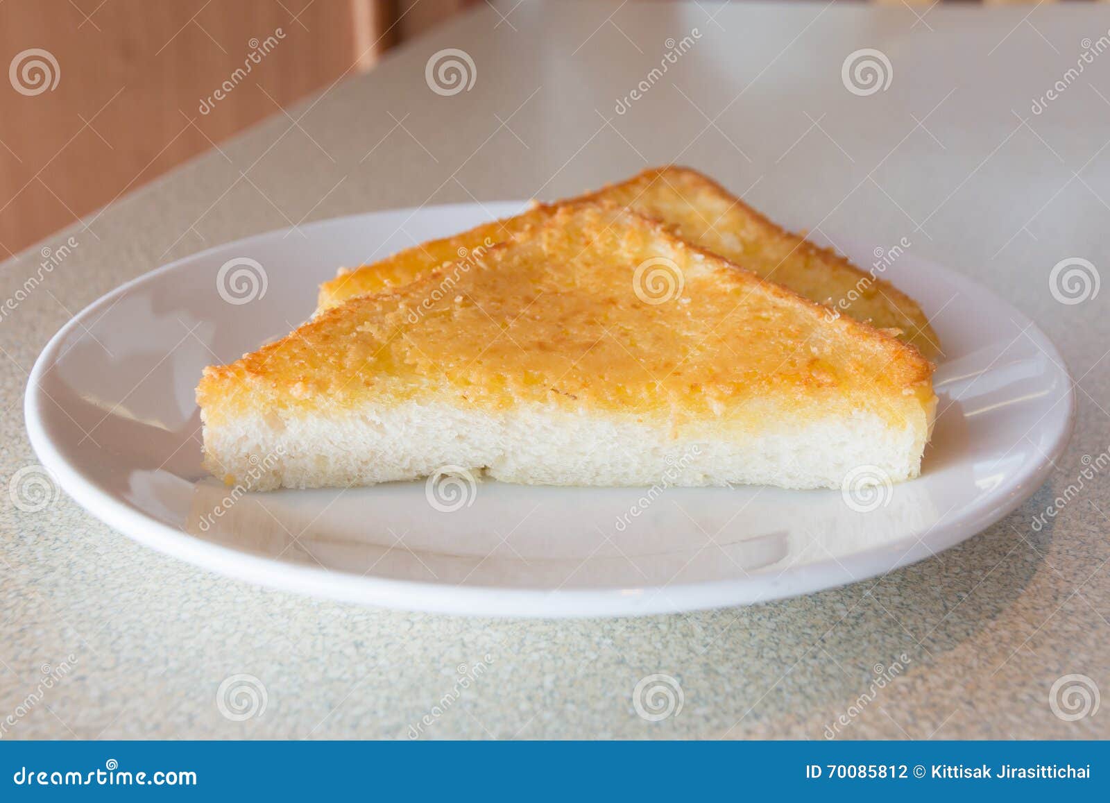 Pan Frito Del Triángulo Con Queso Y Mantequilla Foto de archivo