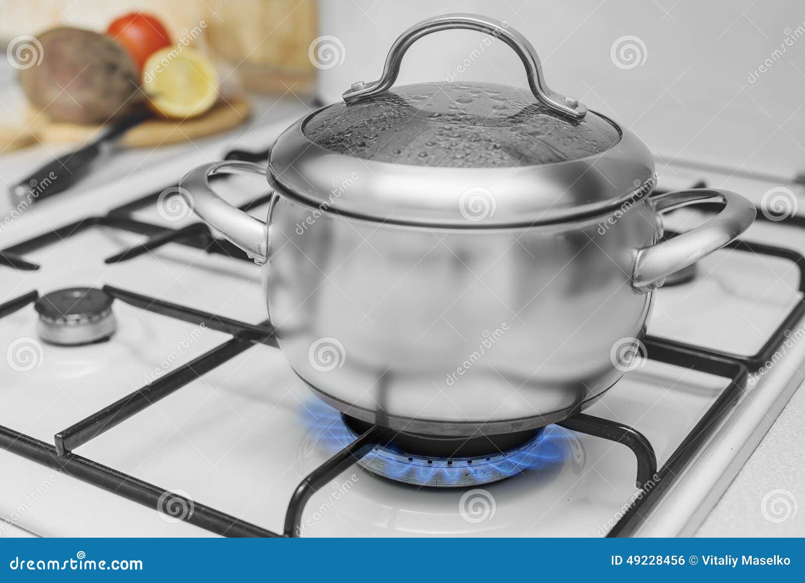 Pan on a gas stove stock photo. Image of natural, burning 49228456