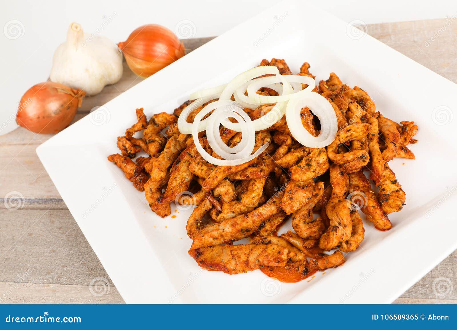 Pan gyros on a plate stock image. Image of onions, food 106509365