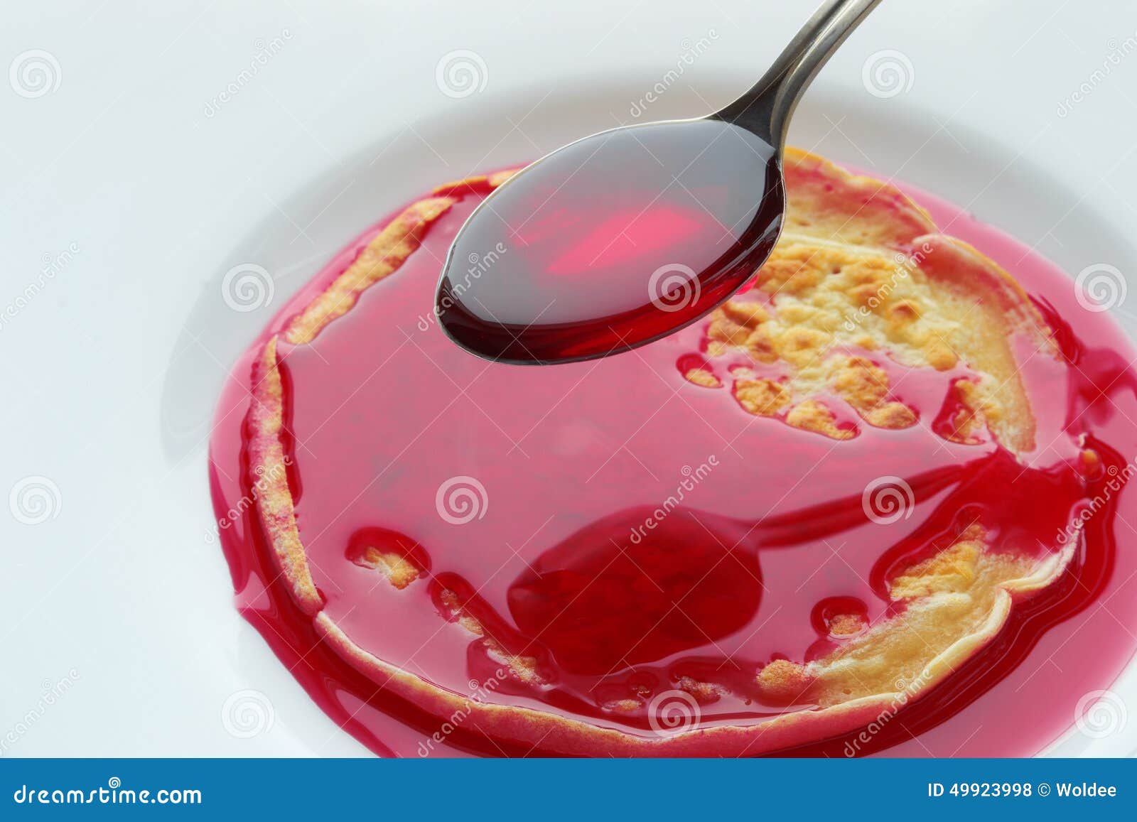 Pancake with cherry syrup stock photo. Image of baked 49923998