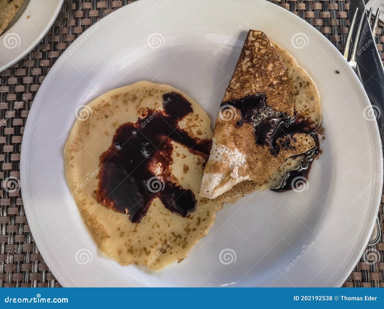 Pancakes with Chocolate Sauce on a Plate at Breakfast in Egypt Stock
