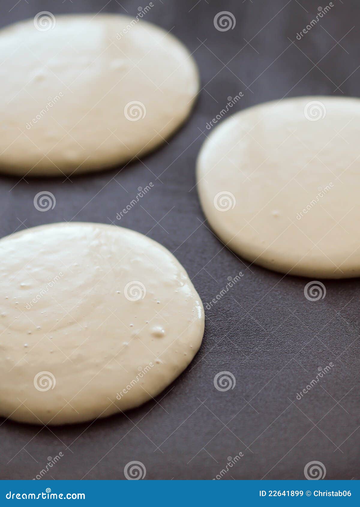 Pancakes Cooking in a Griddle Stock Image Image of uncooked, flat