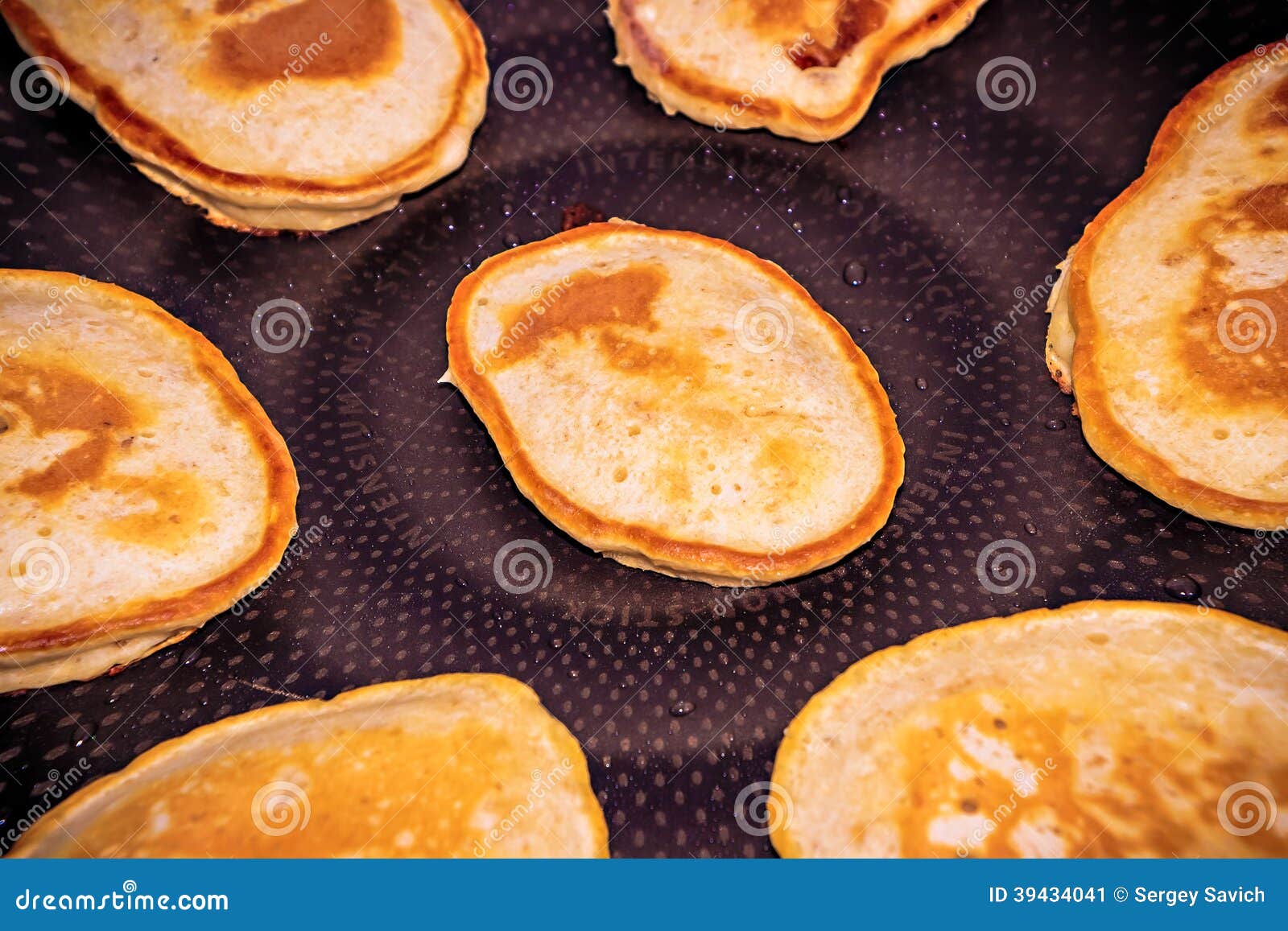 Pancakes in a frying pan stock image. Image of healthy 39434041