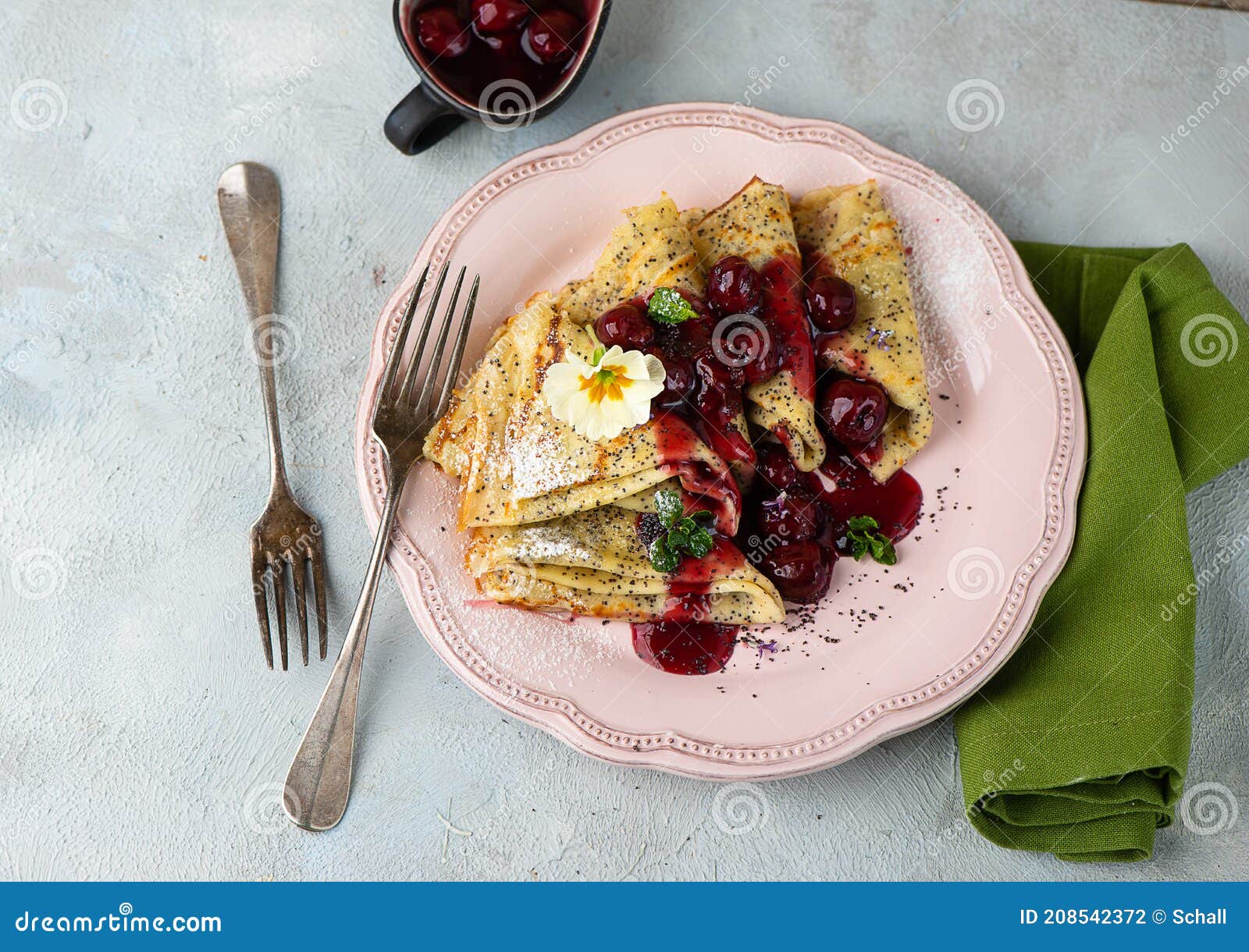 Pancakes with cherries stock photo. Image of cherries 208542372