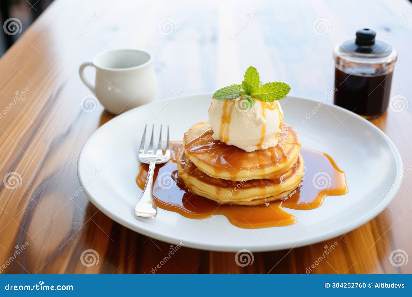 Pancakes with a Scoop of Vanilla Ice Cream and Caramel Sauce Stock ...