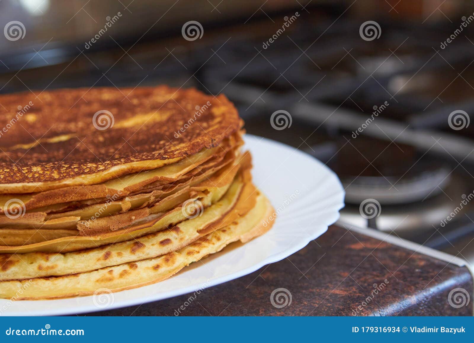 Pancakes at the Stove,baked Pancakes by the Gas Stove in the Kitchen