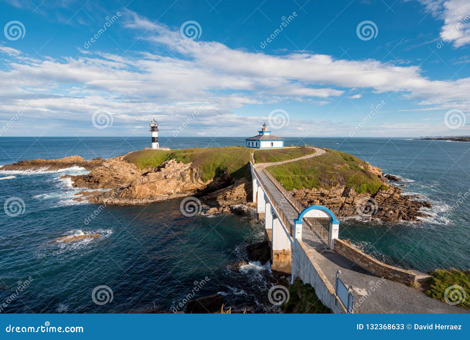 pancha island lighthouse in ribadeo coastline, galicia, spain