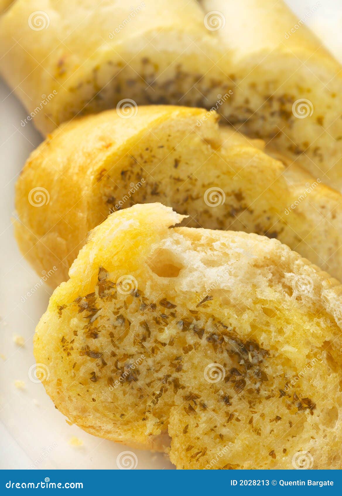 Immagine di macro del baguette del pane di aglio