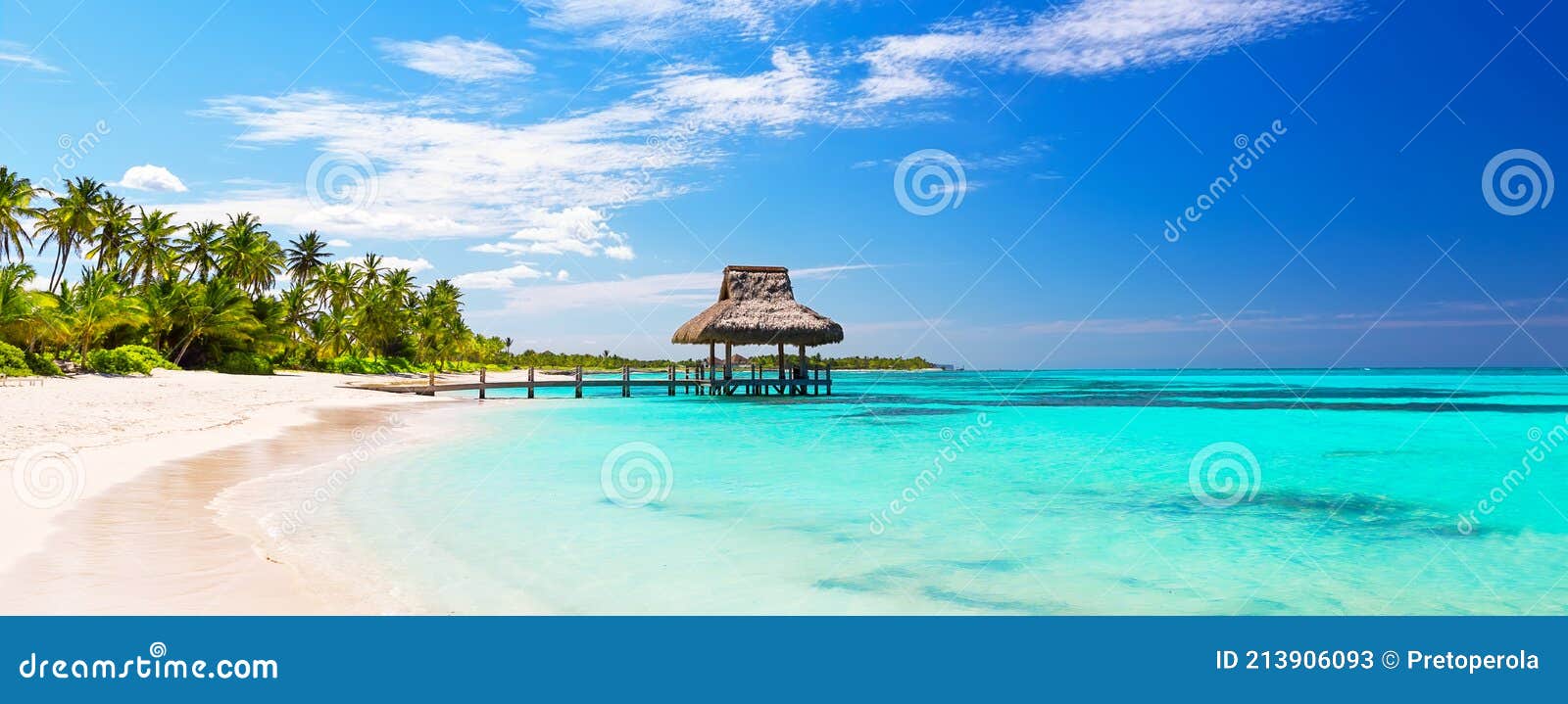 panorama of beautiful gazebo on the tropical white sandy beach in punta cana, dominican republic