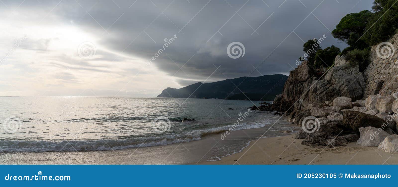 panorama of praia da figueirinho beach on the costa azul in southern portugal