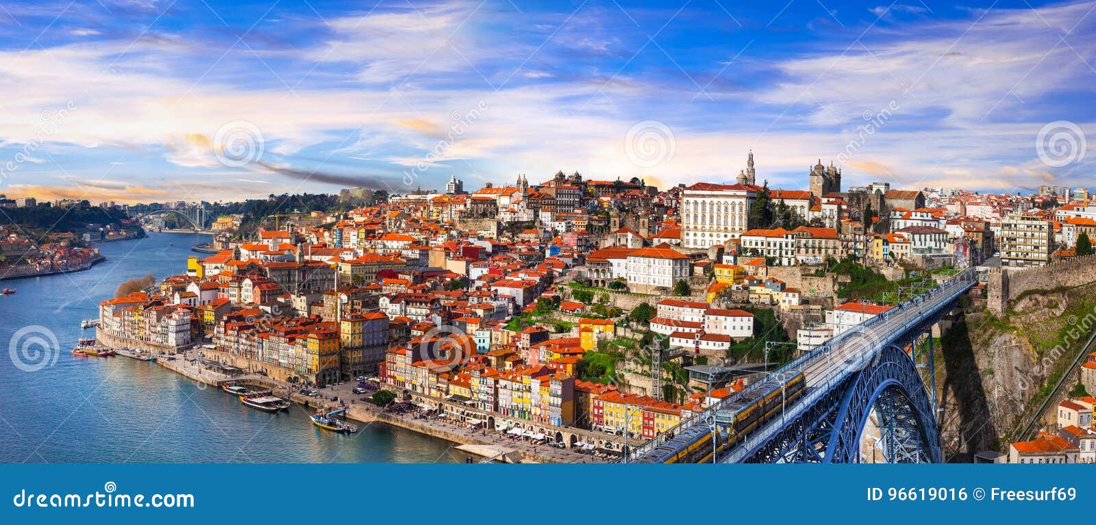 panorama of beautiful porto over sunset - view with famous bridge of luis, portugal