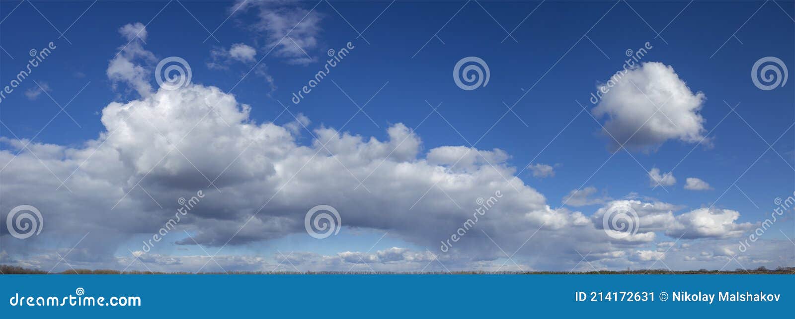 Panorama of Clouds on a Background of Blue Sky. Spring Sky Stock Image