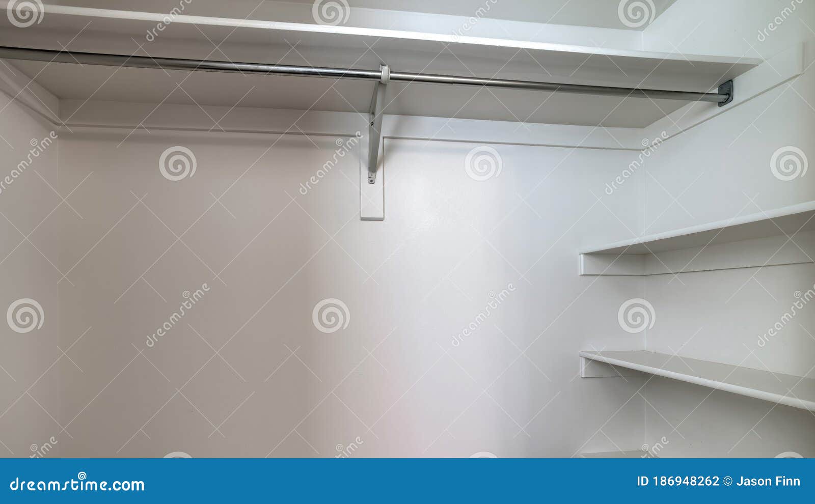 Panorama Crop Empty Walk In Closet Of New Home With Wall Shelves And Hanging Clothes Rod Stock Photo Image Of Architecture Interior 186948262