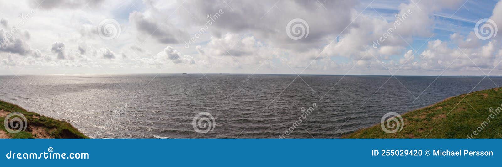 panorama of dramatic summer cloud sky above the baltic sea seen from ales stenar in skÃÂ¥ne scania sweden