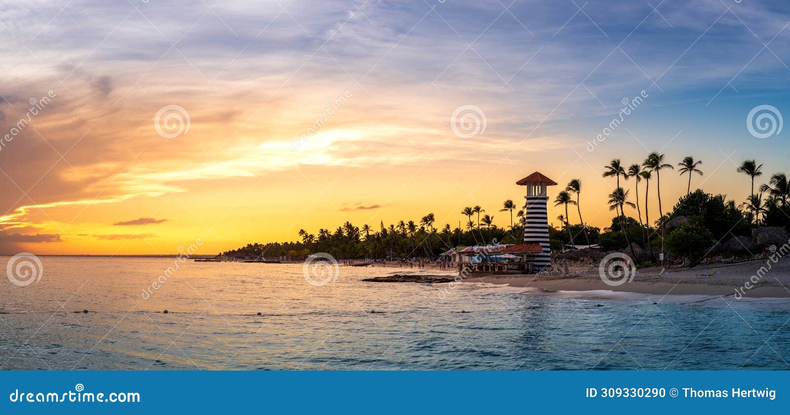 panorama of dramatic sunset at bayahibe beach, la romana, dominican republic